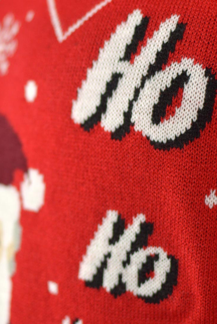 Couple's Christmas Jumper with Santa Coming through the Chimney detail