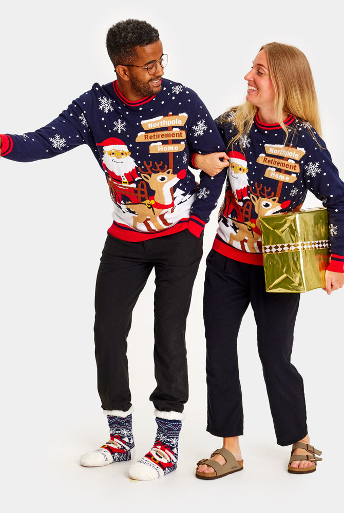 Couple's Christmas Jumper Santa with a Walker on the way to Retirement