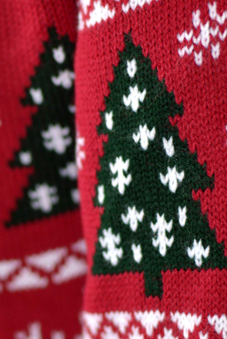 detail Red Couple's Christmas Jumper with Reindeers, Trees and Gifts