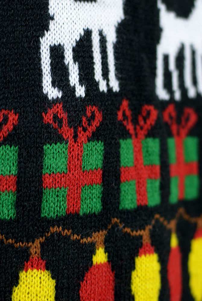 Black Family Christmas Jumper with Trees, Reindeers and Gifts Detail