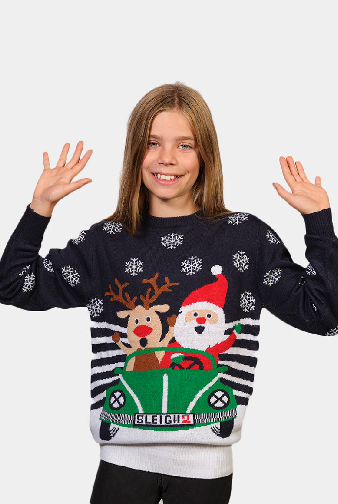Girls Family Christmas Jumper with Santa and Reindeer Driving