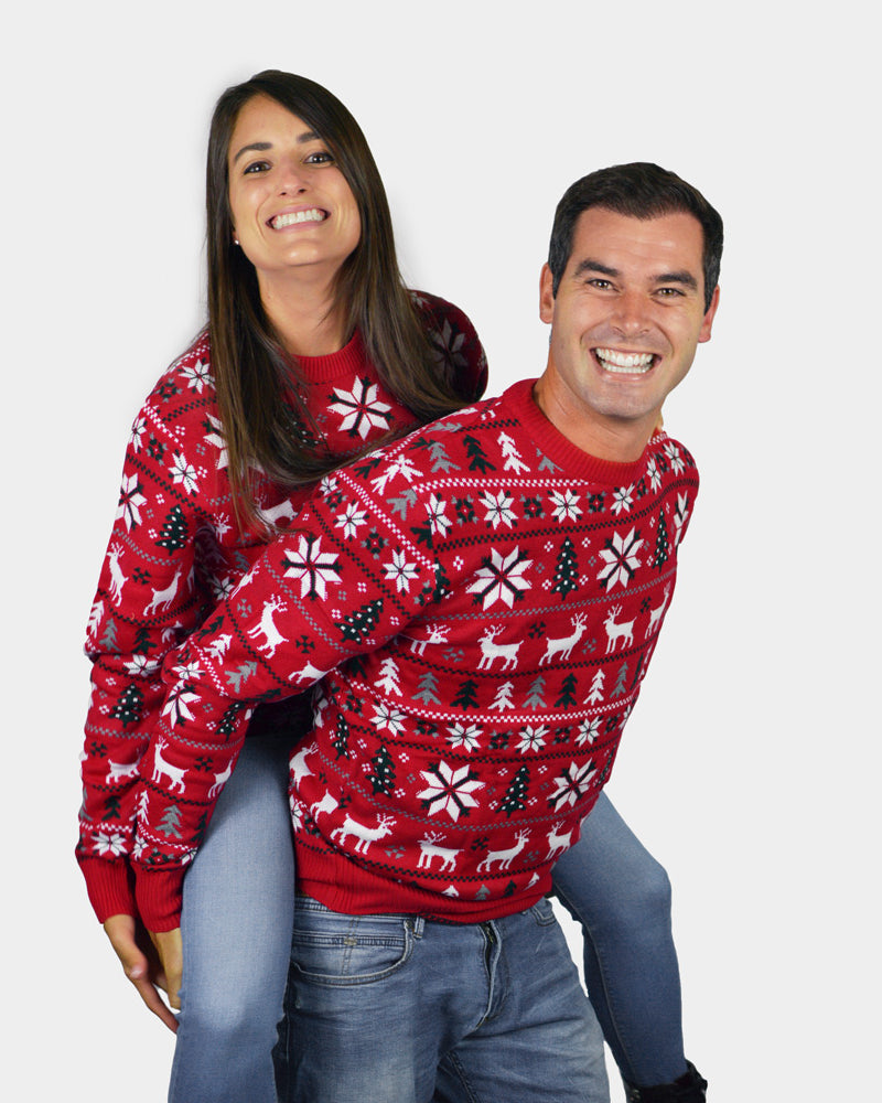 Red Family Christmas Jumper with Reindeers, Trees and Polar Star couple