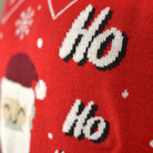 Couple's Christmas Jumper with Santa Coming through the Chimney detail